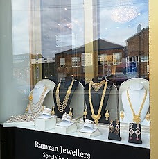 The Ramzan Jewellers shopfront window display at 133 Albert Drive, Glasgow